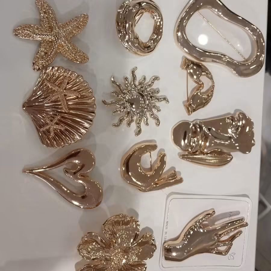 gold broches