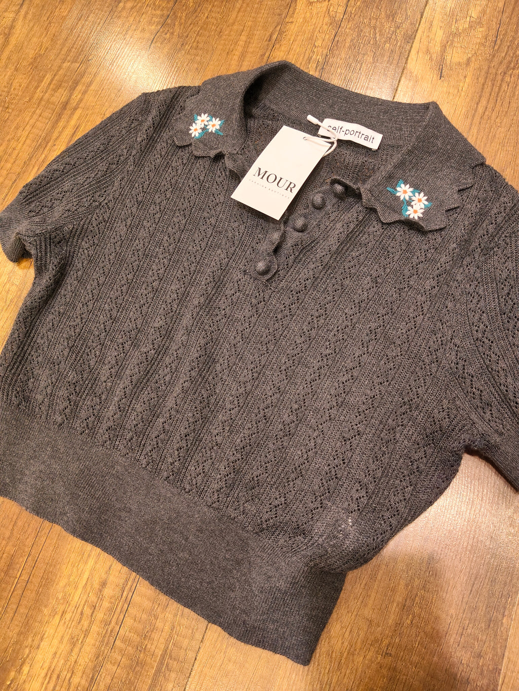 Embroideried knit collar top