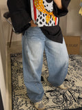 The cross wide denim pants