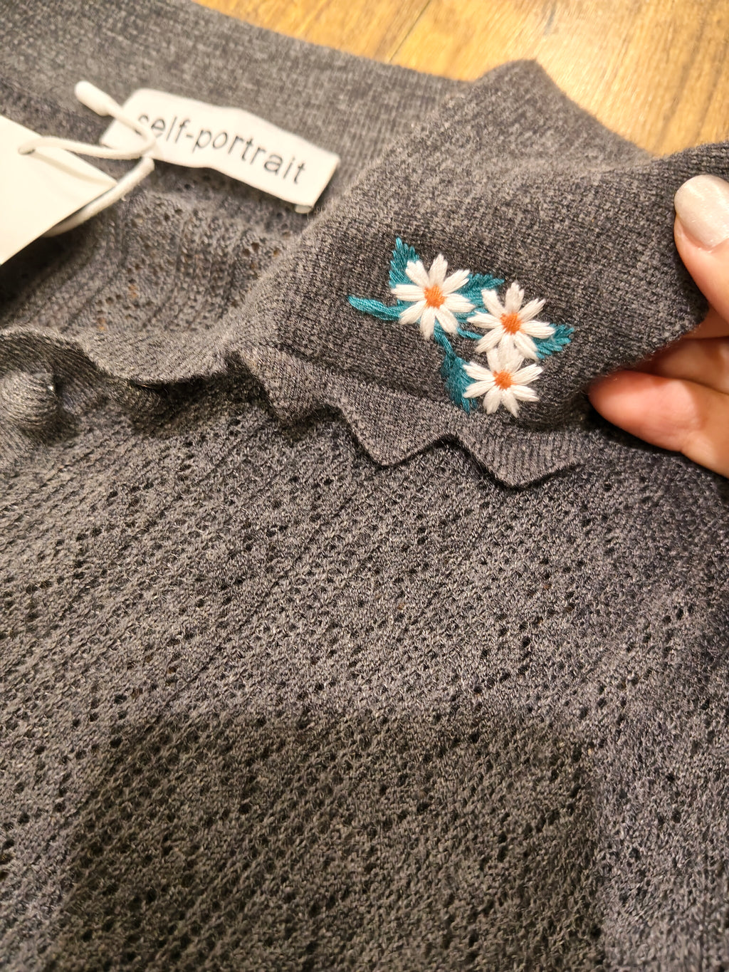 Embroideried knit collar top