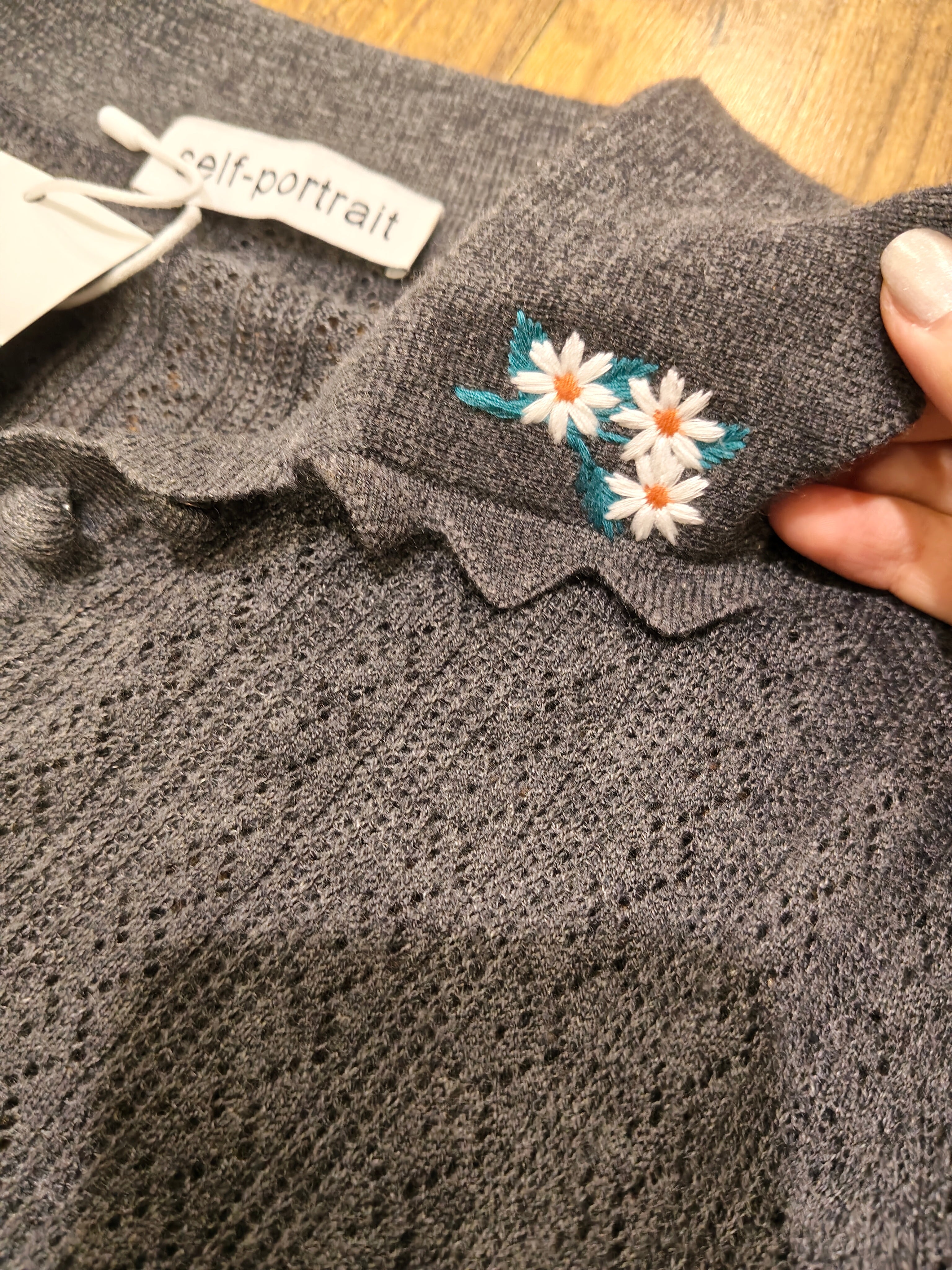 Embroideried knit collar top