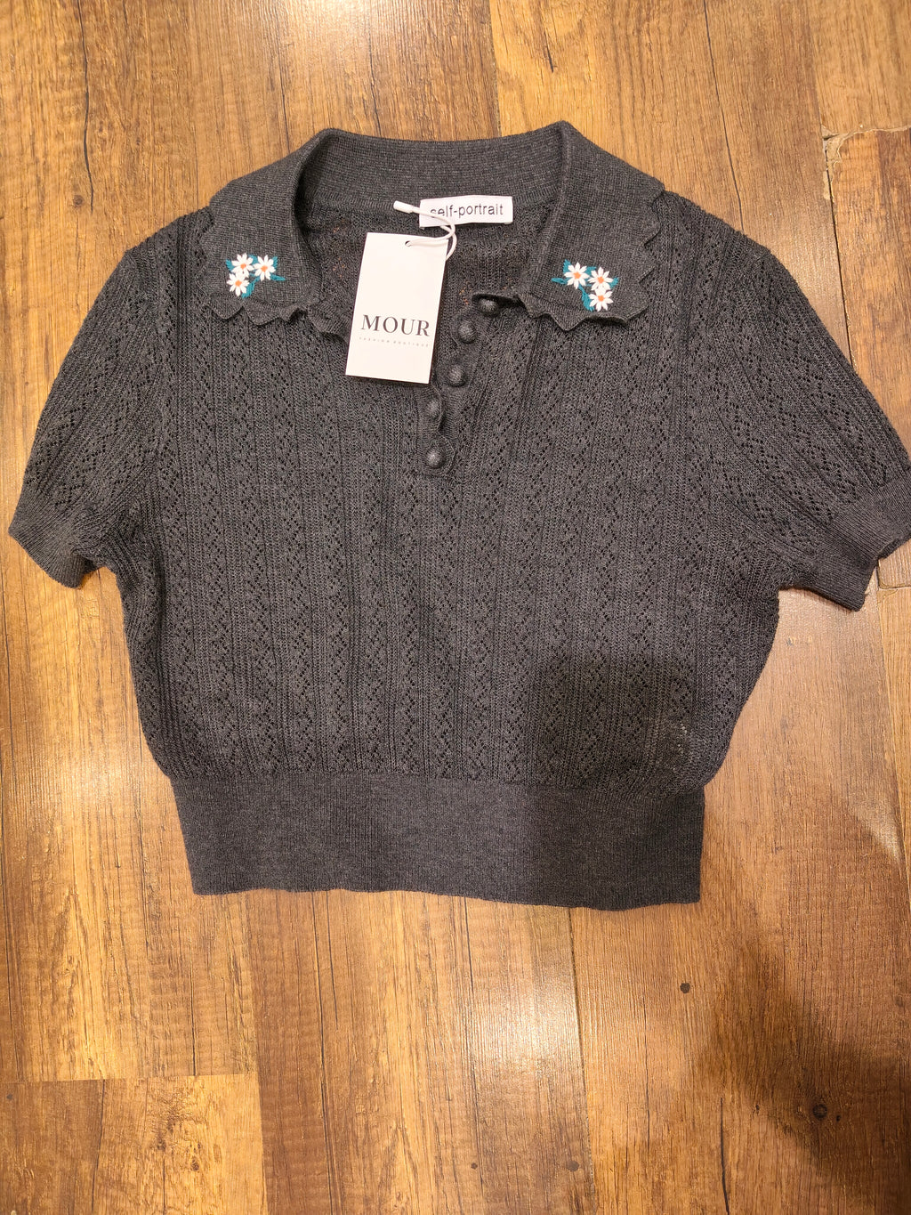 Embroideried knit collar top