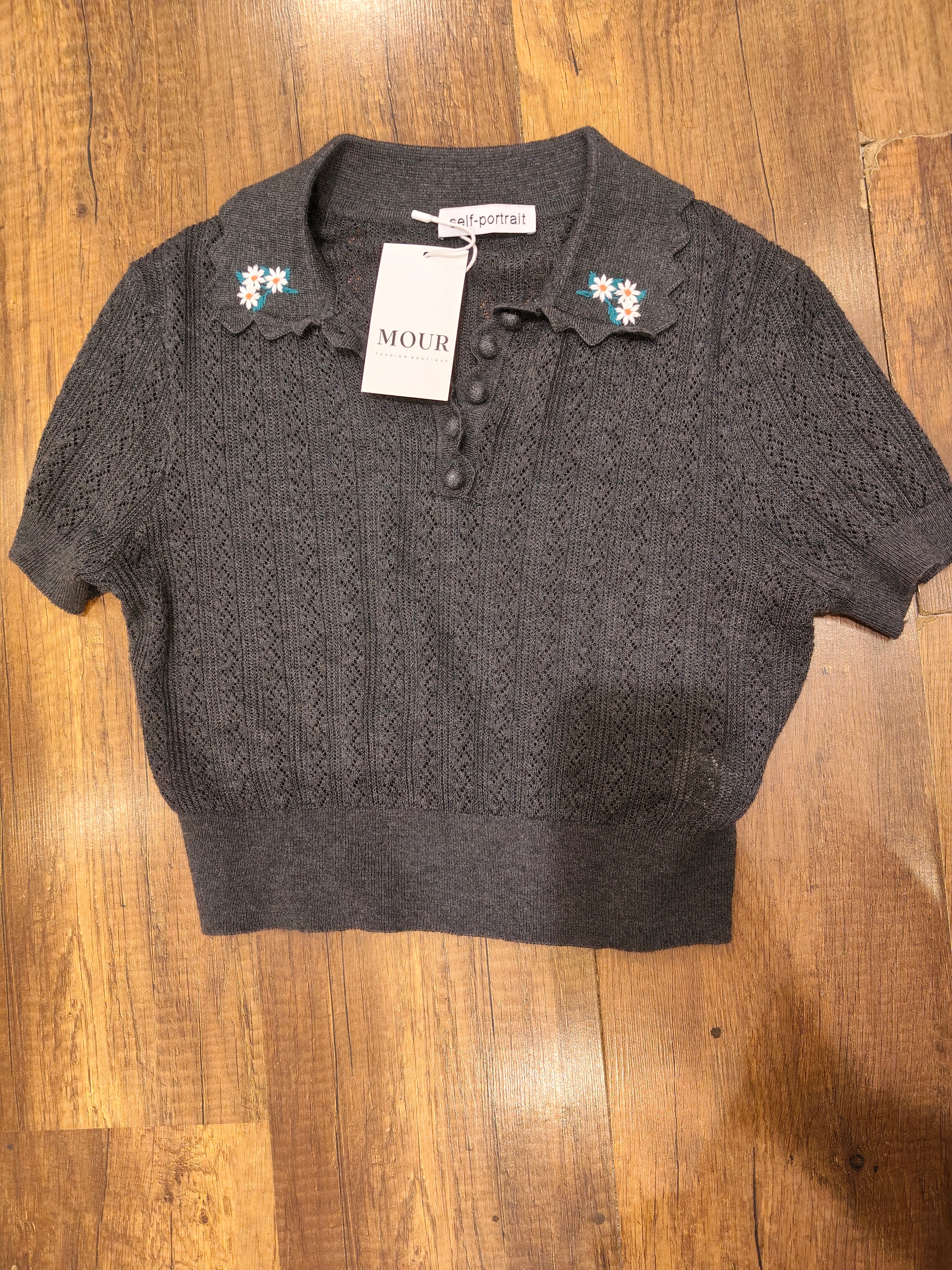 Embroideried knit collar top